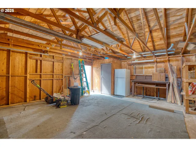 a view of a room with wooden walls