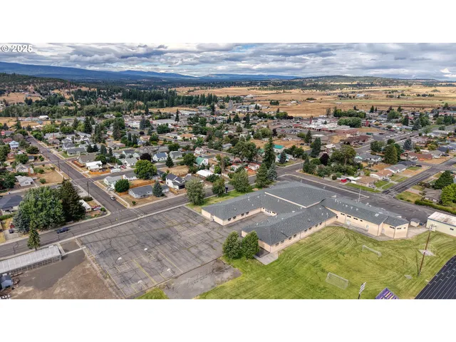 a black and white photo of a house