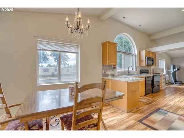 a view of living room and kitchen