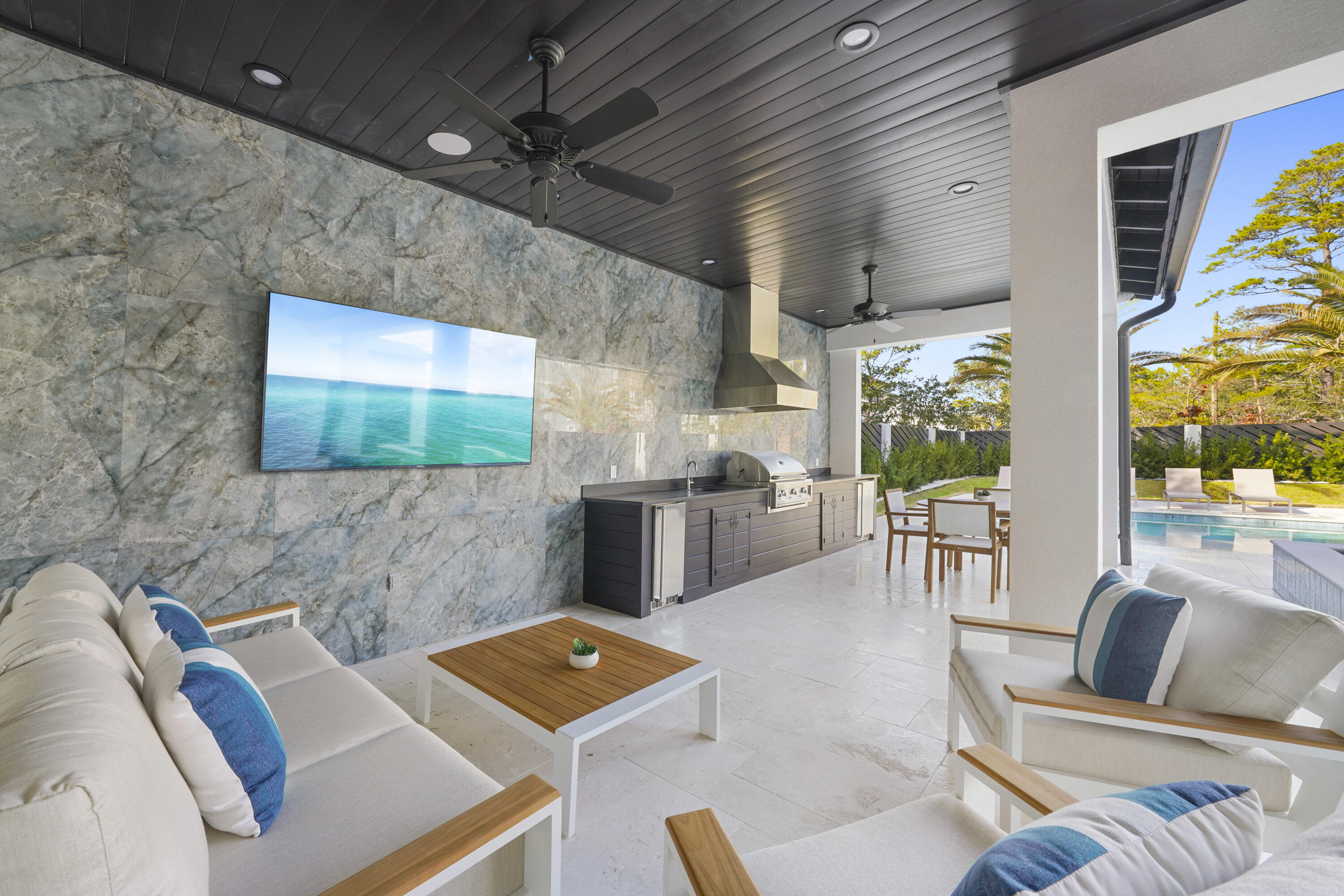 51 Penny Lane Santa Rosa Beach, FL 32459 - Photo 20 of 80 a living room with couches and a flat screen tv