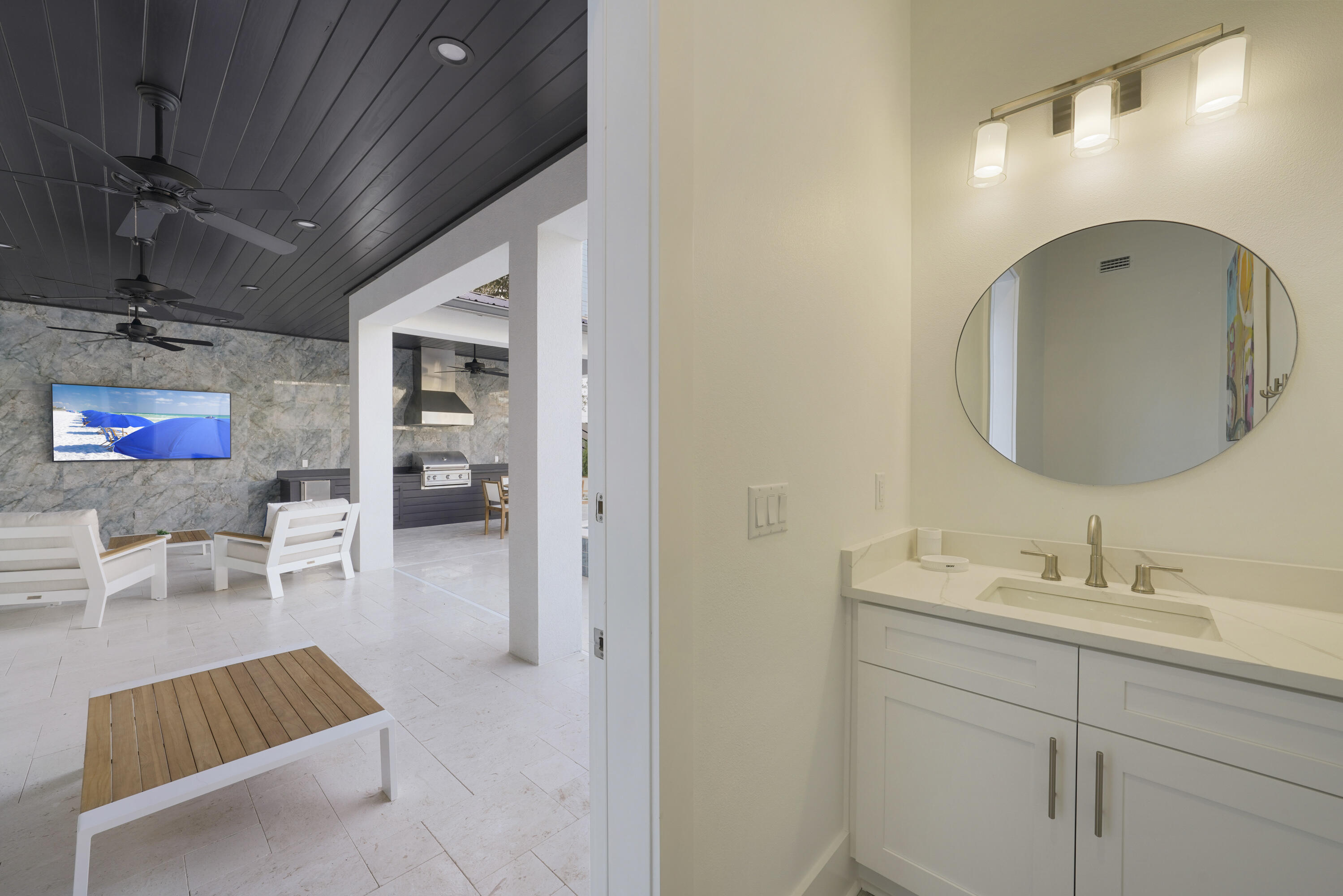 51 Penny Lane Santa Rosa Beach, FL 32459 - Photo 22 of 80 a bathroom with a sink and a mirror