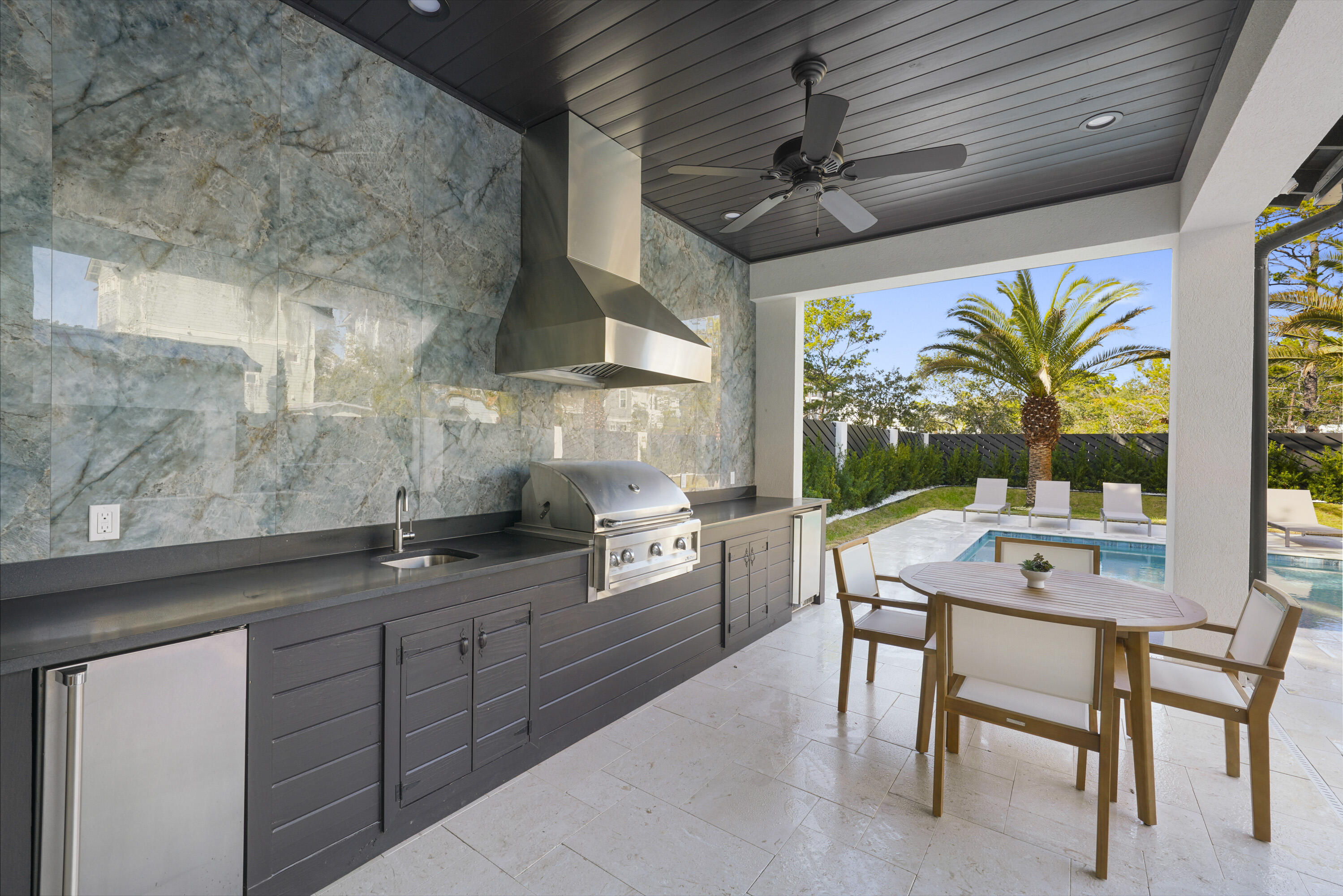 51 Penny Lane Santa Rosa Beach, FL 32459 - Photo 24 of 80 a kitchen with a table chairs and a counter top space