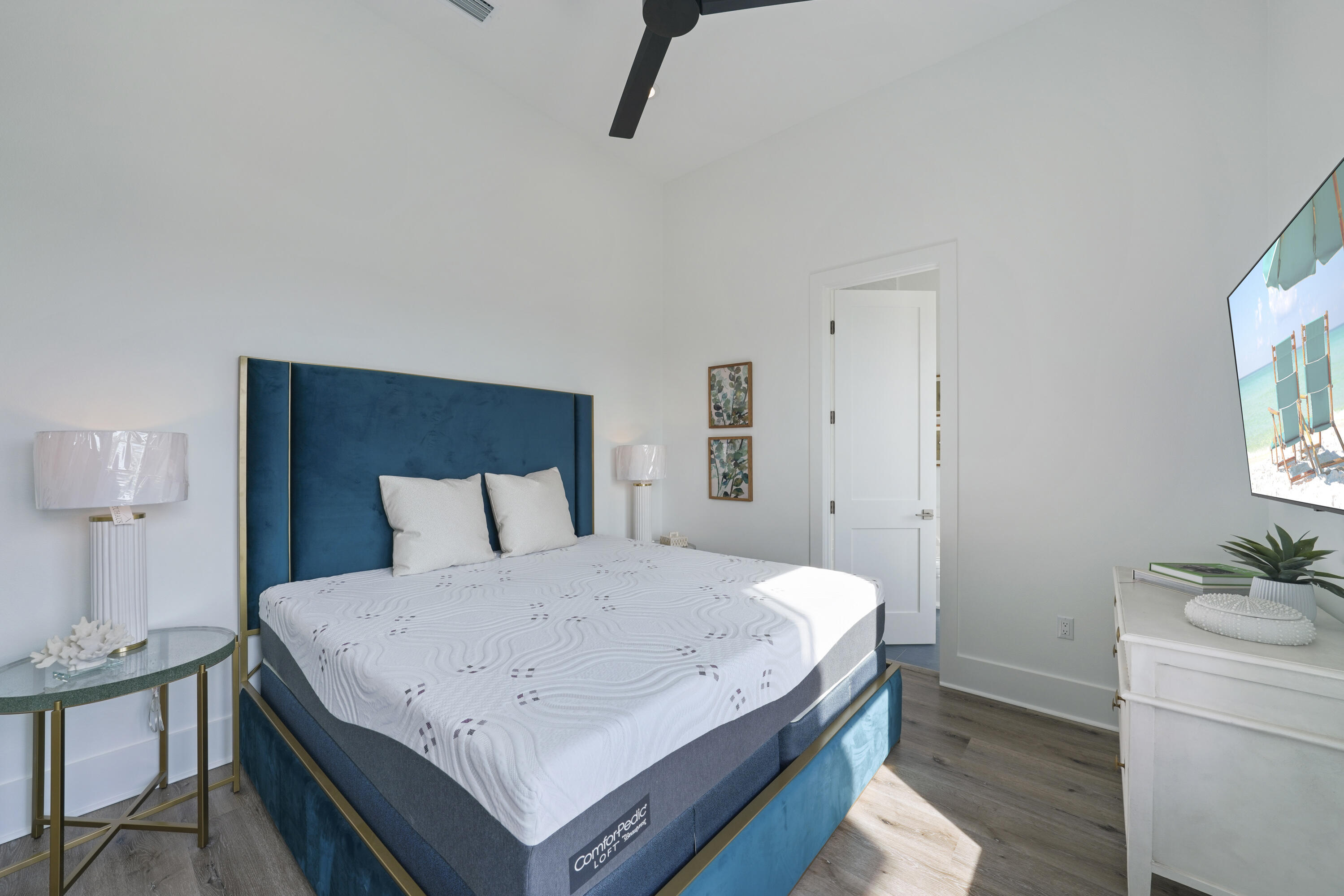 51 Penny Lane Santa Rosa Beach, FL 32459 - Photo 30 of 80 a bedroom with a bed and a table in it