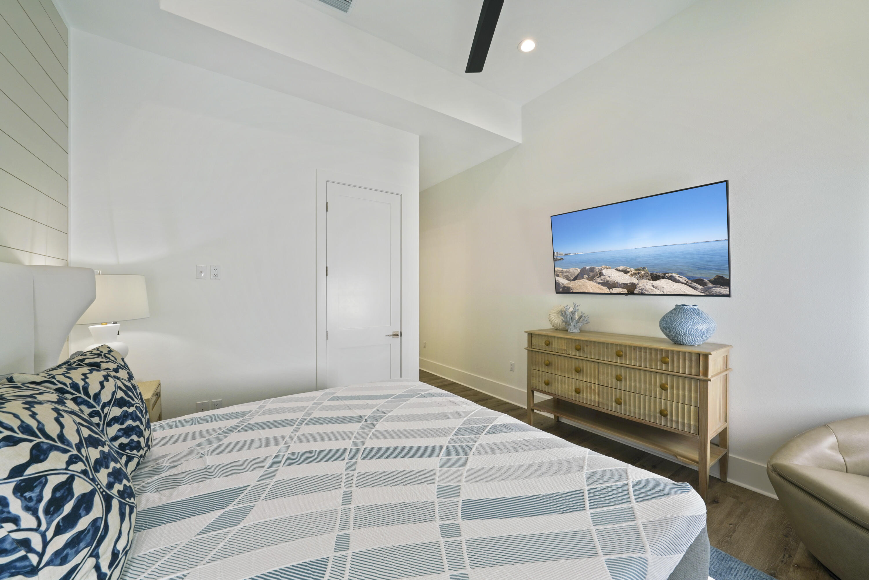 51 Penny Lane Santa Rosa Beach, FL 32459 - Photo 37 of 80 a bedroom with a bed and wooden floor