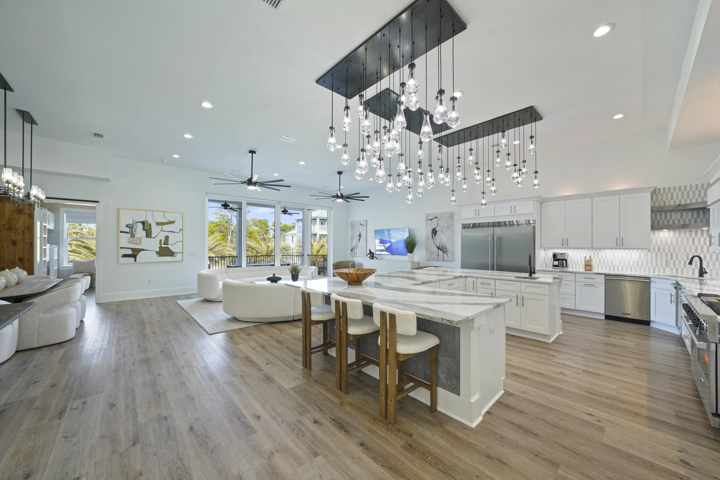 51 Penny Lane Santa Rosa Beach, FL 32459 - Photo 40 of 80 a large kitchen with a table and chairs