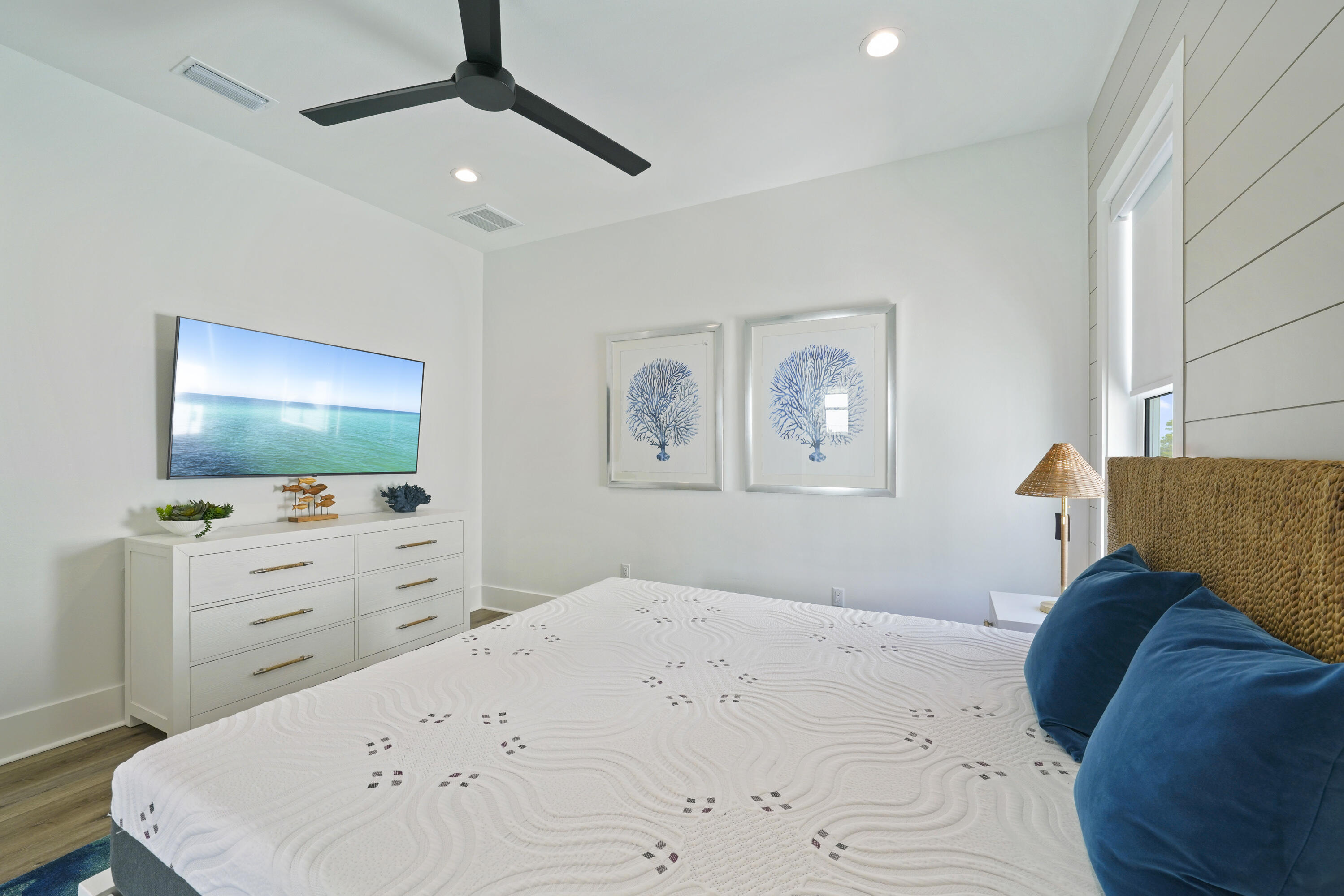 51 Penny Lane Santa Rosa Beach, FL 32459 - Photo 56 of 80 a bedroom with a bed and a flat screen tv