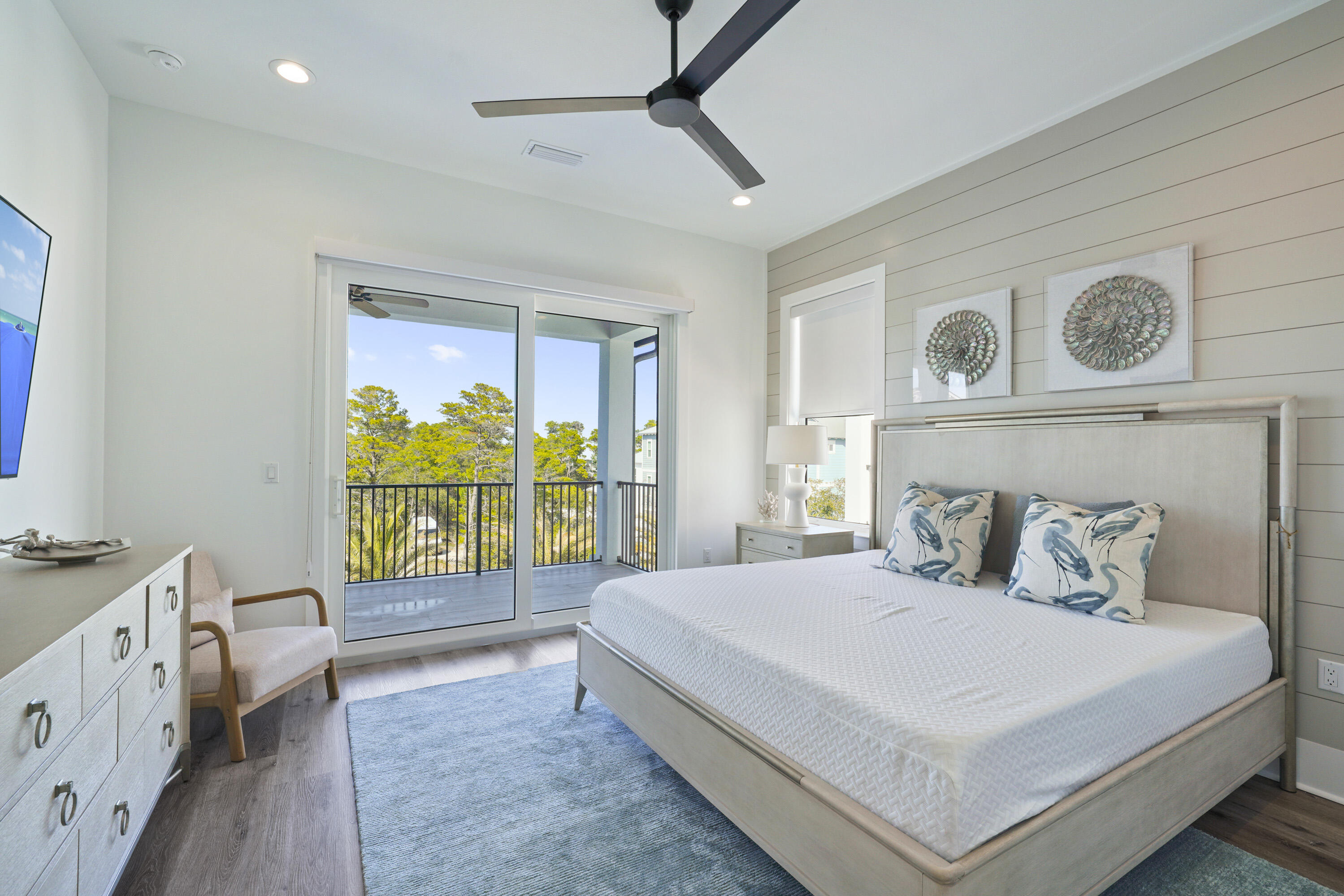 51 Penny Lane Santa Rosa Beach, FL 32459 - Photo 61 of 80 a bedroom with a bed a dresser next to a window