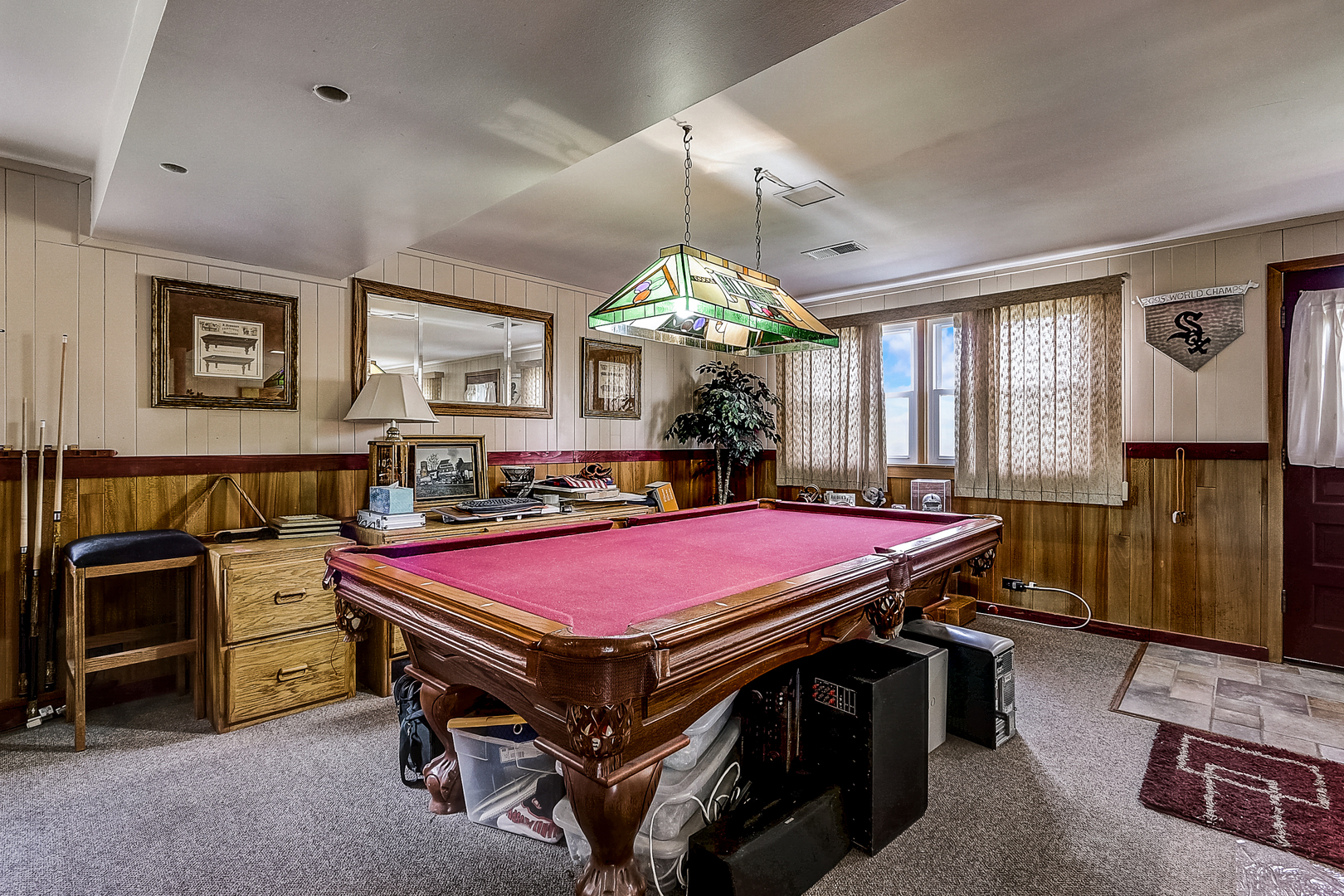 1342 Willow Road Homewood, IL 60430 - Photo 22 of 27 a room with a bed and a chandelier