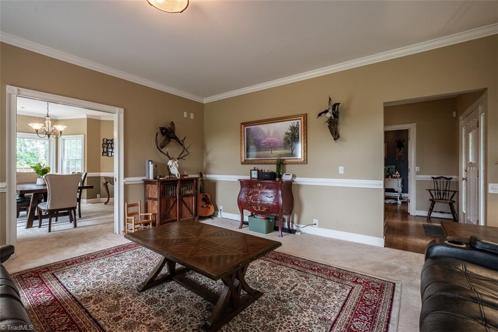 328 Laurelwood Road State Road, NC 28676 - Photo 15 of 39 Living room opens to dining room and foyer and is ideal for entertaining.