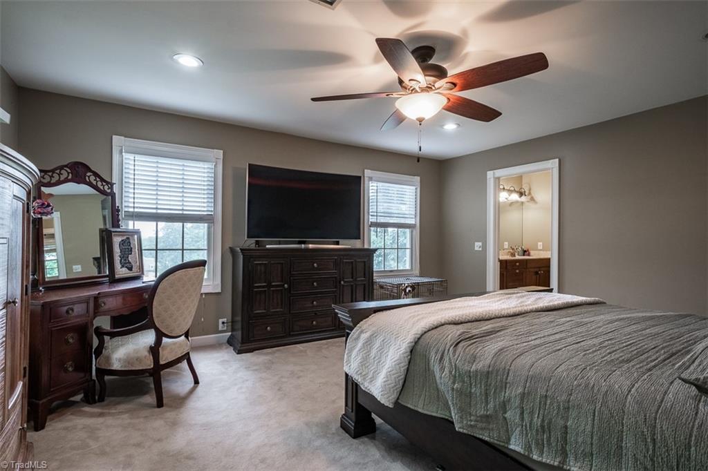 328 Laurelwood Road State Road, NC 28676 - Photo 23 of 39 Primary bedroom located on second level with en-suite bath.