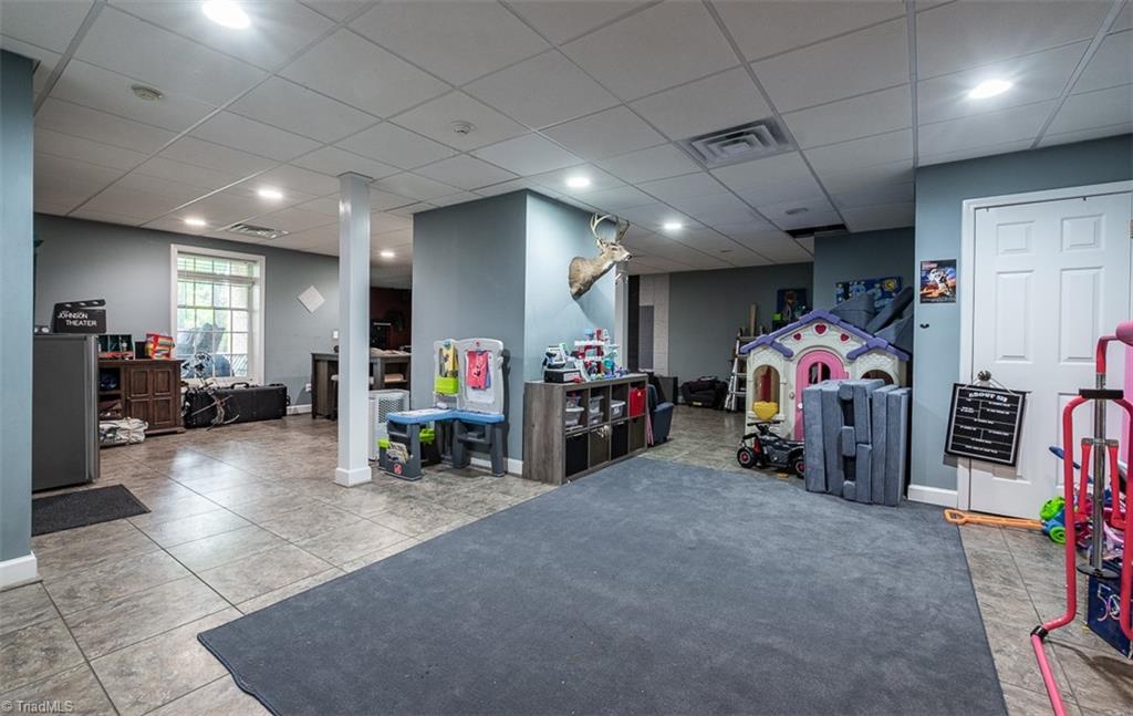 328 Laurelwood Road State Road, NC 28676 - Photo 32 of 39 Recreation room located in the finished basement.