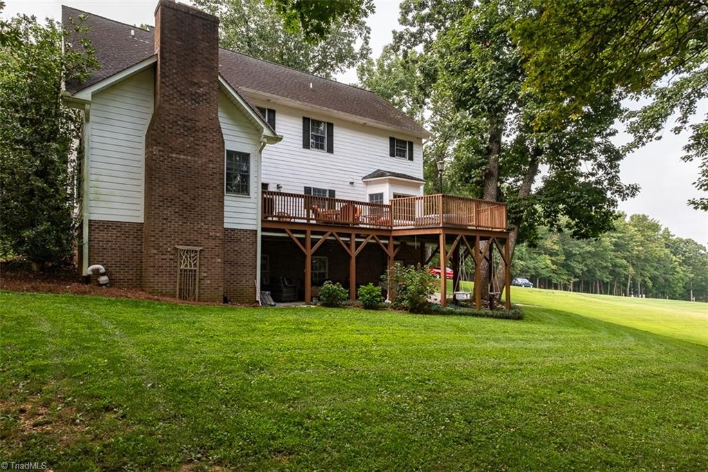 Rear view of home and back deck.