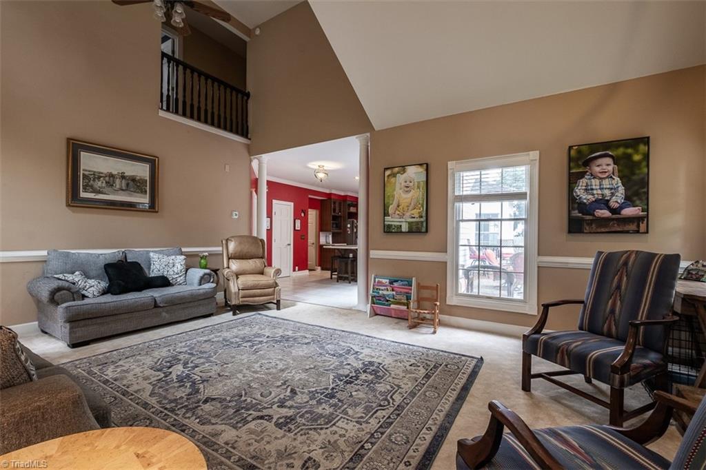 328 Laurelwood Road State Road, NC 28676 - Photo 9 of 39 Great room with cathedral ceiling looking toward kitchen.