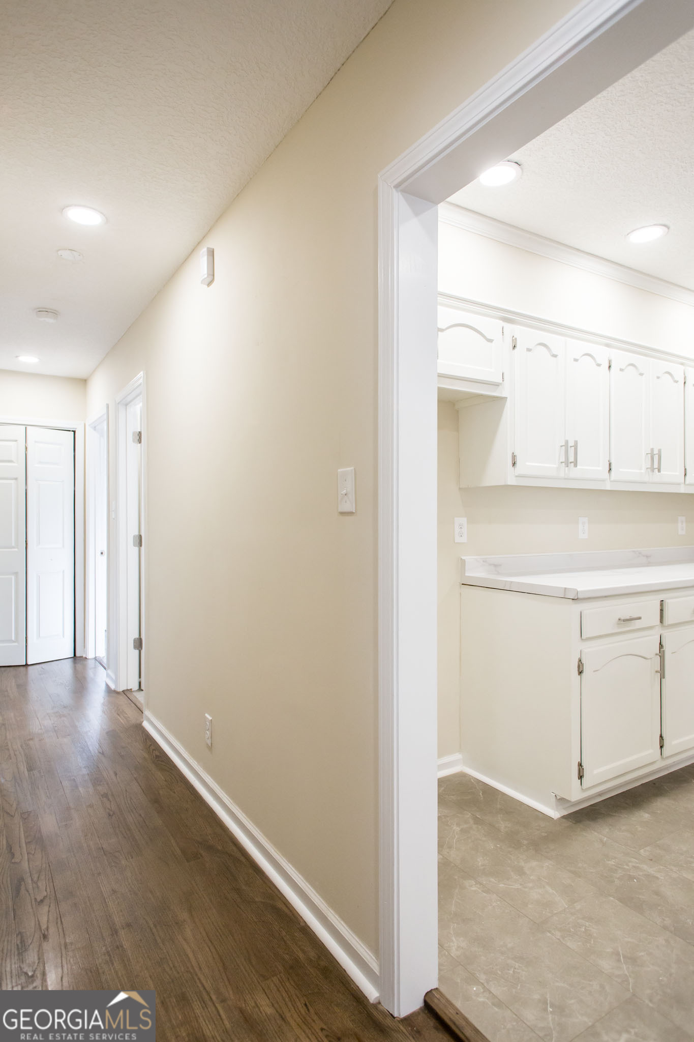 407 Pineview Drive Waycross, GA 31501 - Photo 16 of 35 a view of a kitchen with white cabinets