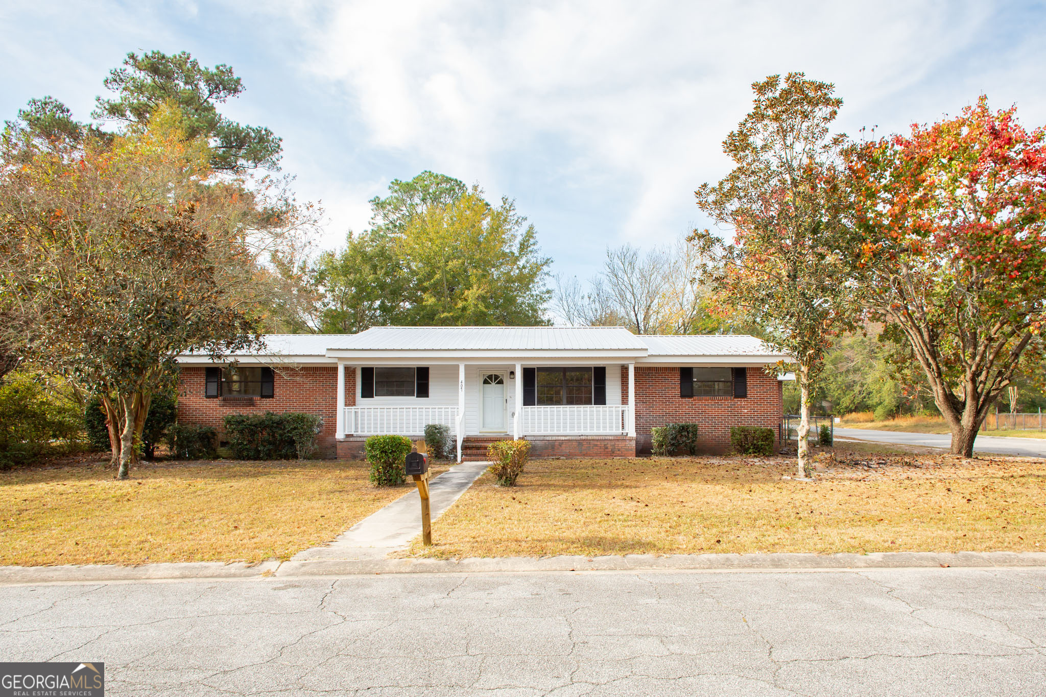 407 Pineview Drive Waycross, GA 31501 - Photo 2 of 35 a view of a house with a patio