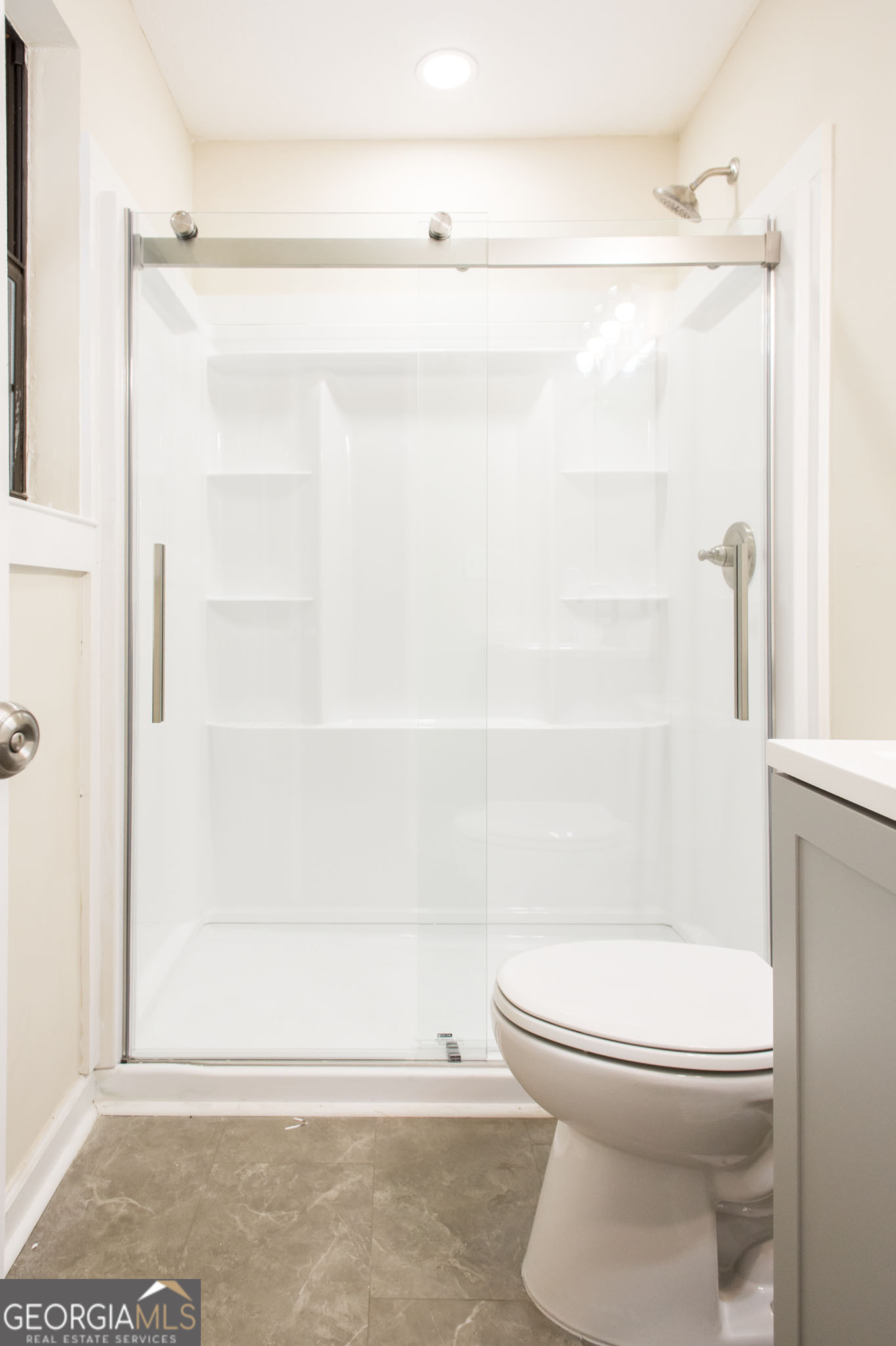 407 Pineview Drive Waycross, GA 31501 - Photo 25 of 35 a bathroom with a toilet and a shower