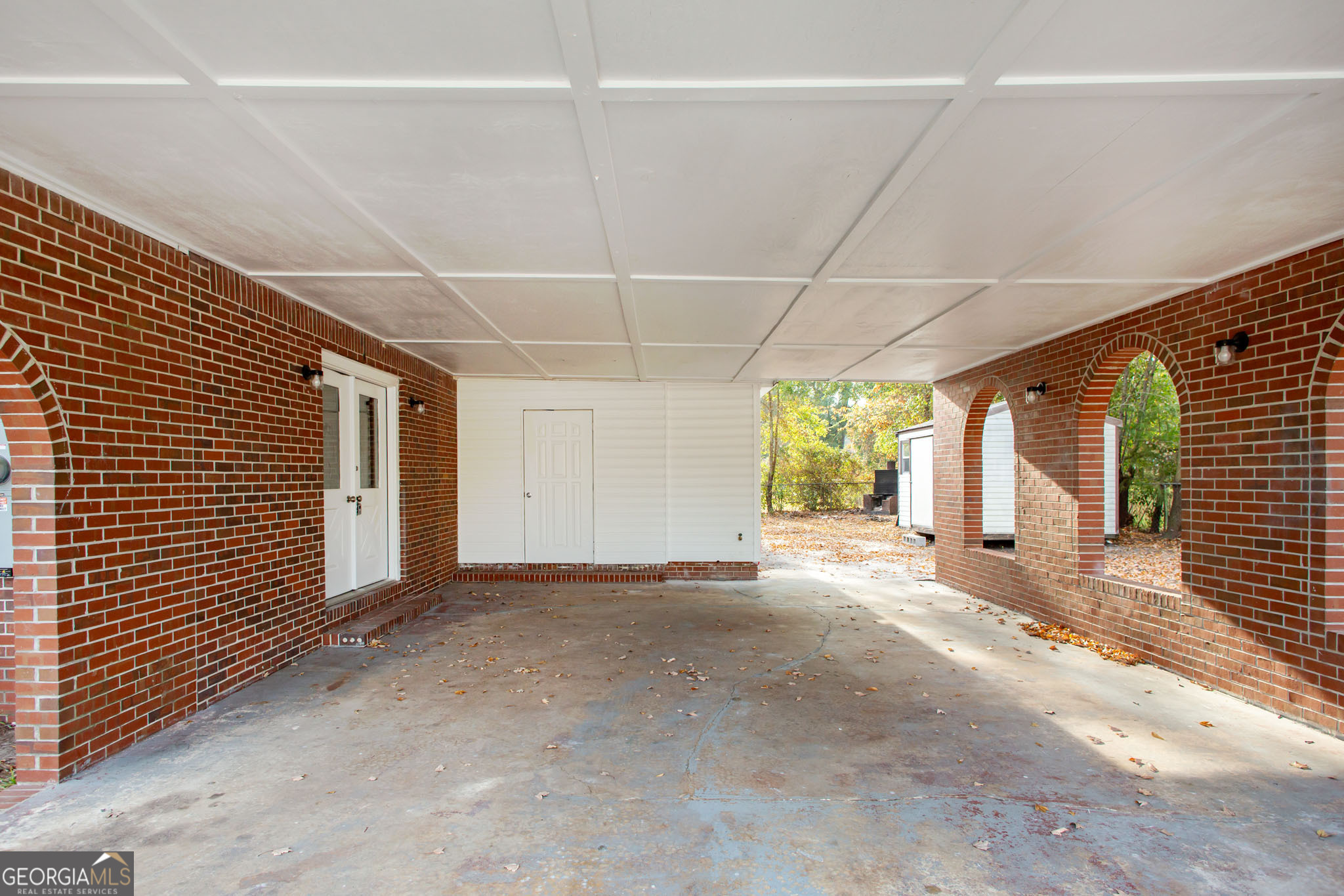 407 Pineview Drive Waycross, GA 31501 - Photo 34 of 35 a view of a livingroom with an empty space and a window