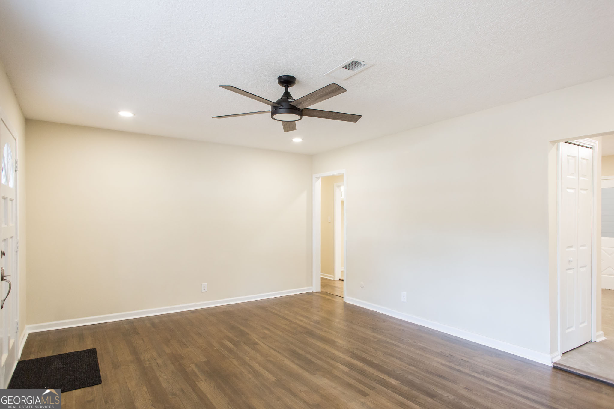 407 Pineview Drive Waycross, GA 31501 - Photo 6 of 35 wooden floor in an empty room