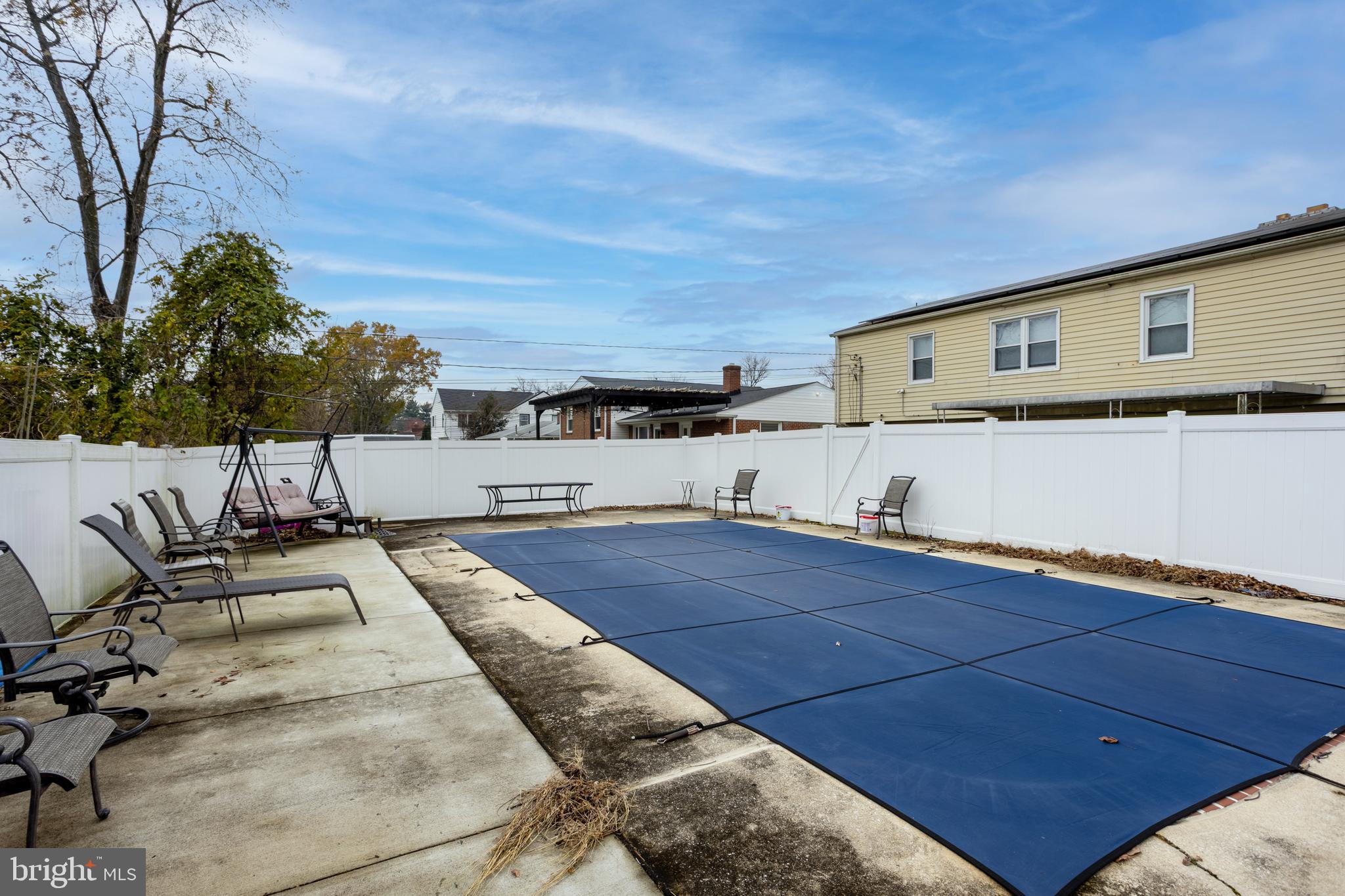 3215 Northbrook Road Baltimore, MD 21208 - Photo 45 of 50 a view of a patio with chairs and potted plants