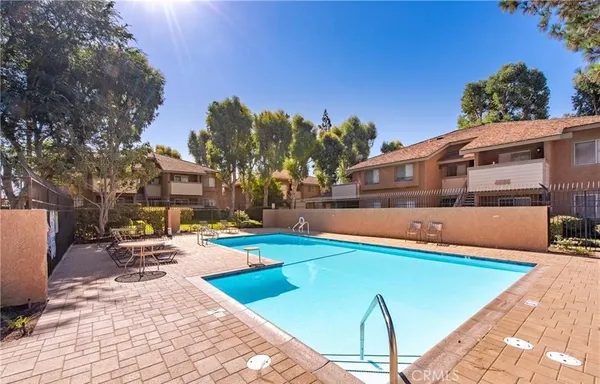 a view of a house with swimming pool