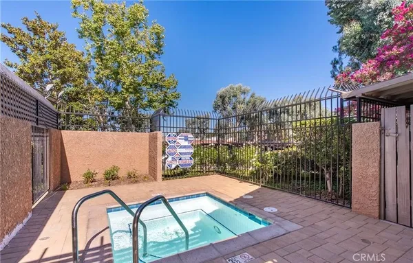 a view of swimming pool from a balcony