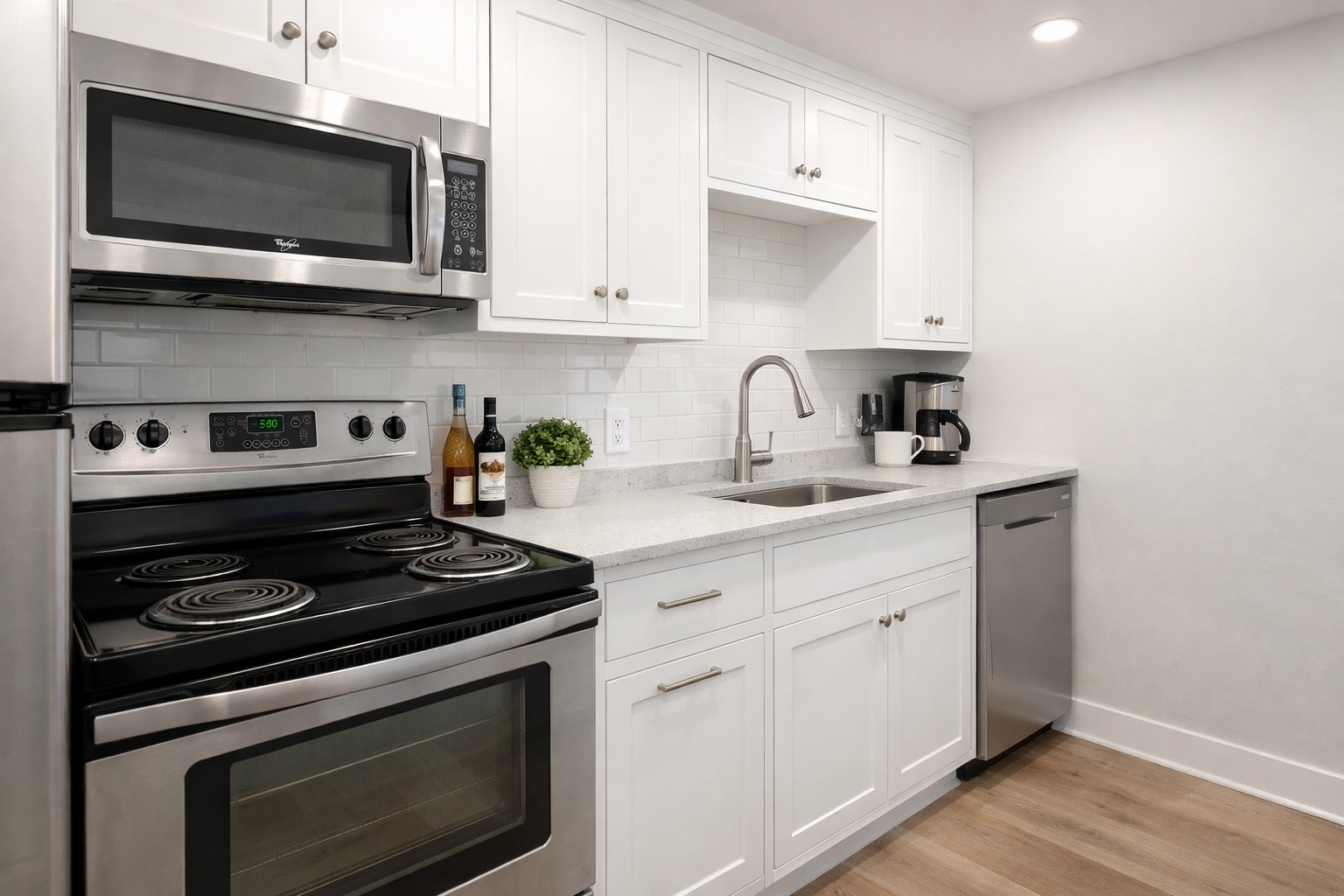 1209 Bomar Street Houston, TX 77006 - Photo 17 of 23 This guest house kitchenette offers great potential with a simple refresh. Envision bright white cabinetry, updated countertops, and sleek stainless steel appliances to transform the space into a clean, modern setup—perfect for guests, rental income, or a private retreat.Virtual Image.