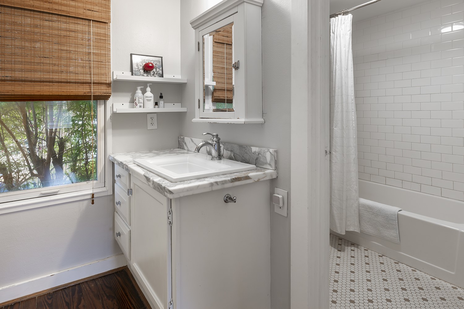 1209 Bomar Street Houston, TX 77006 - Photo 19 of 23 a bathroom with a sink toilet and shower