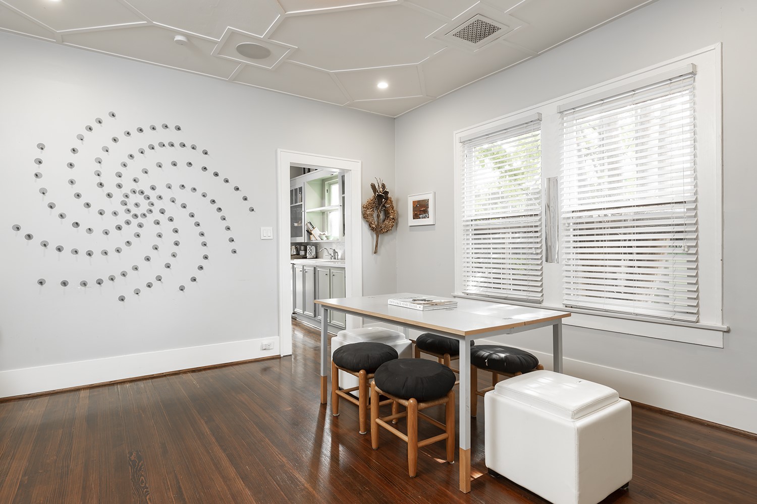 1209 Bomar Street Houston, TX 77006 - Photo 5 of 23 a view of a workspace with furniture and a window