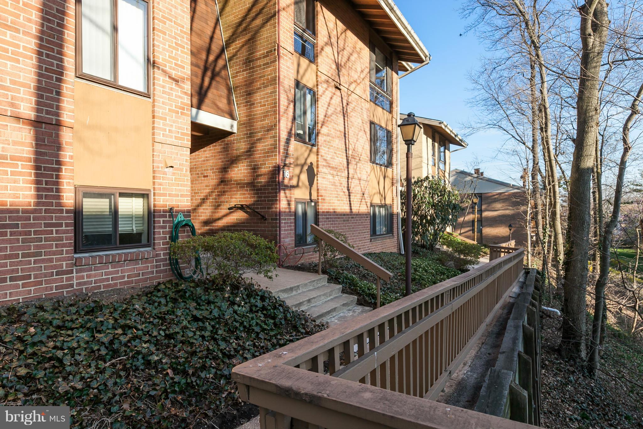 16 Cross Keys Road, Unit 16D Baltimore, MD 21210 - Photo 2 of 29 a view of balcony with wooden floor and fence
