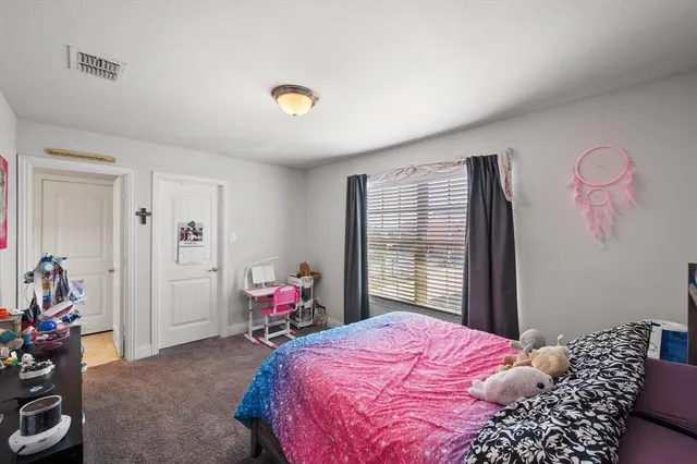 a workspace with furniture and window