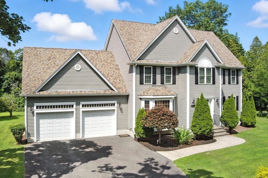 30 Neponset Street Walpole, MA 02071 - Photo 2 of 41 front view of a house with a yard