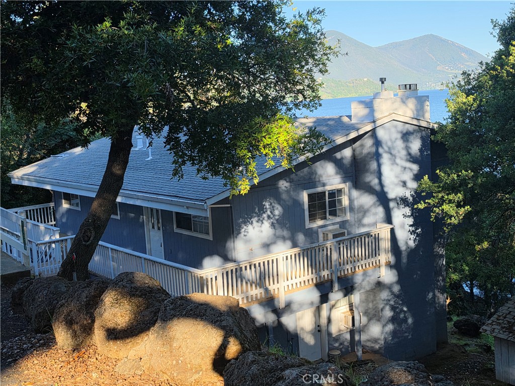 13674 Anderson Road Lower Lake, CA 95457 - Photo 1 of 38 a view of a house with a yard