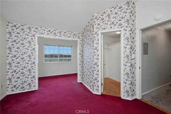 wooden floor in a gallery with a window