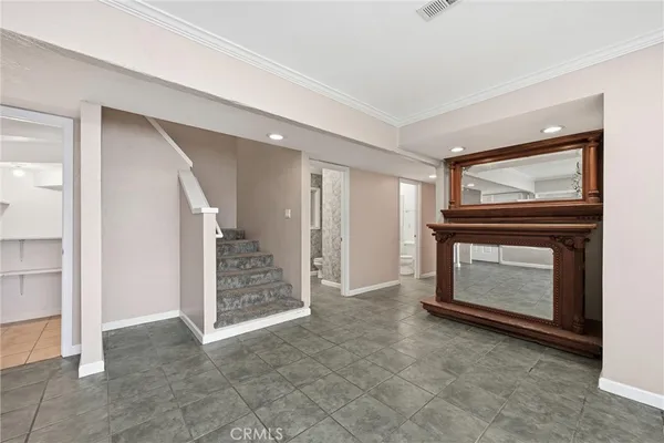 a view of an empty room fire place and a fireplace