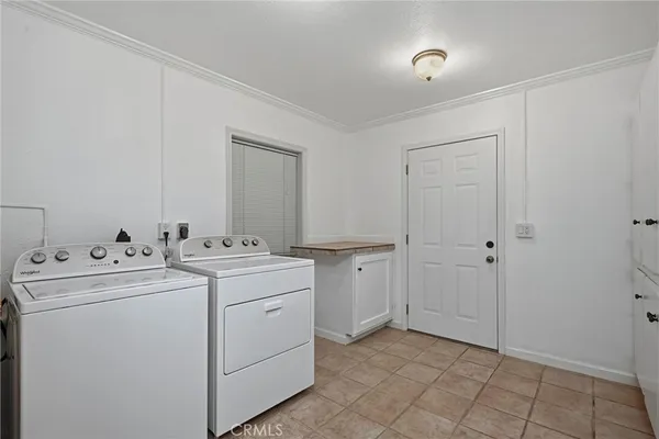 a view of utility room with washer and dryer