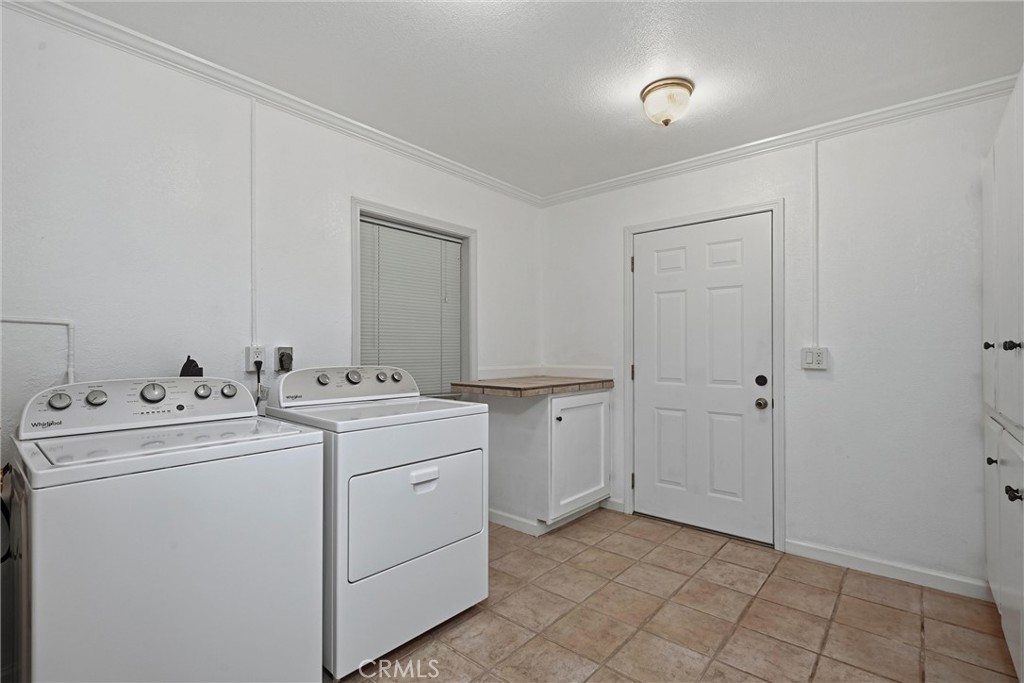 13674 Anderson Road Lower Lake, CA 95457 - Photo 28 of 38 a view of utility room with washer and dryer