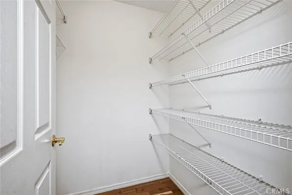 a view of a room with racks on the wall