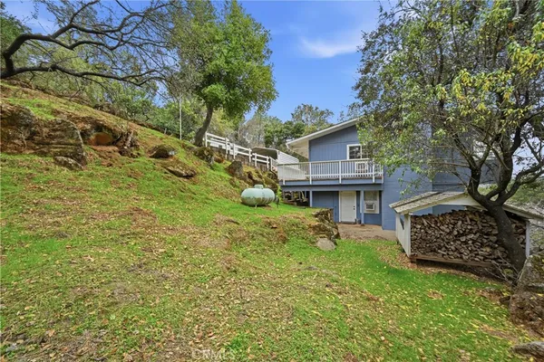 a backyard of a house with seating space