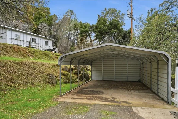 a backyard of a house with lots of green space