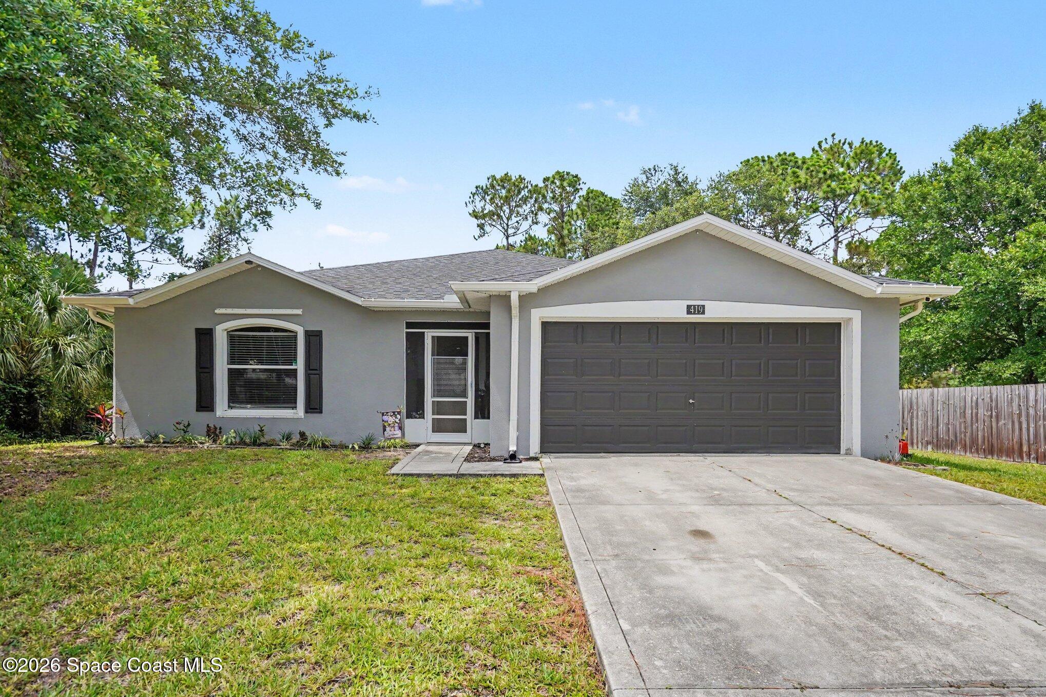 419 Hamer Road Southwest Palm Bay, FL 32908 - Photo 2 of 17 419 Hamer Front