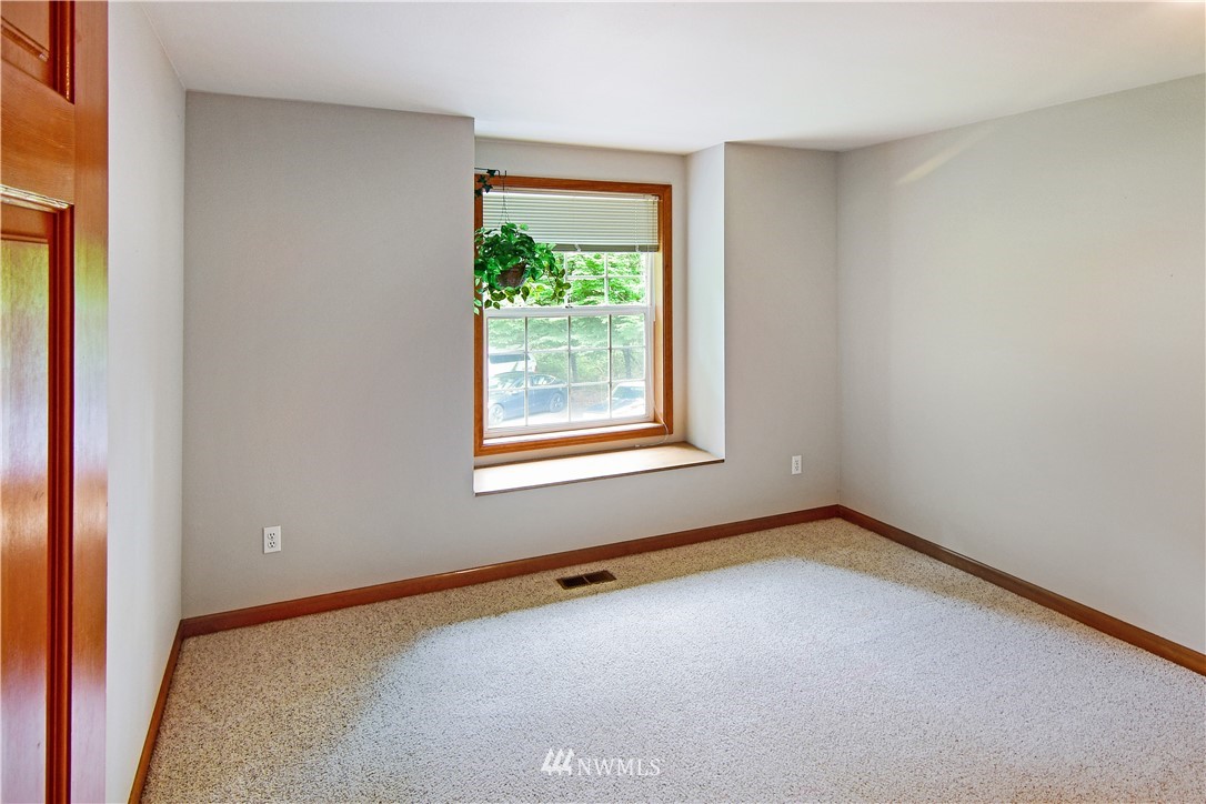 4025 204th Street Southeast Bothell, WA 98012 - Photo 19 of 35 an empty room with a window