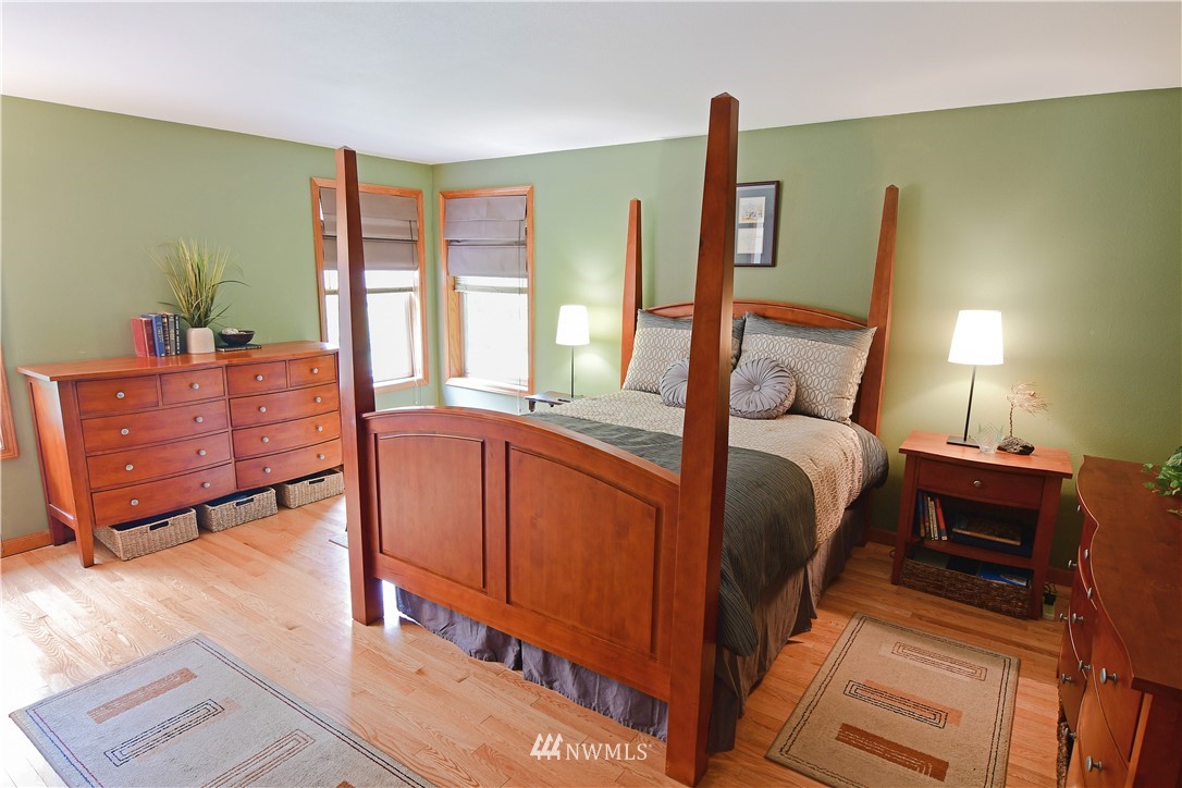 4025 204th Street Southeast Bothell, WA 98012 - Photo 21 of 35 a bedroom with furniture and a window