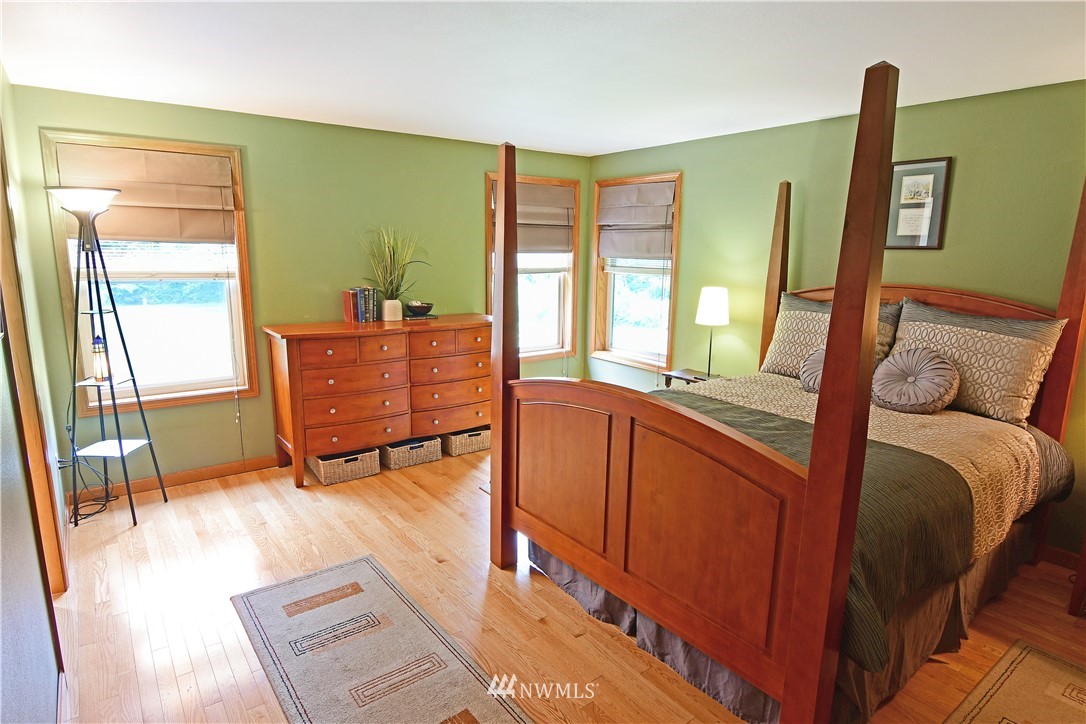 4025 204th Street Southeast Bothell, WA 98012 - Photo 22 of 35 a living room with furniture and a large window