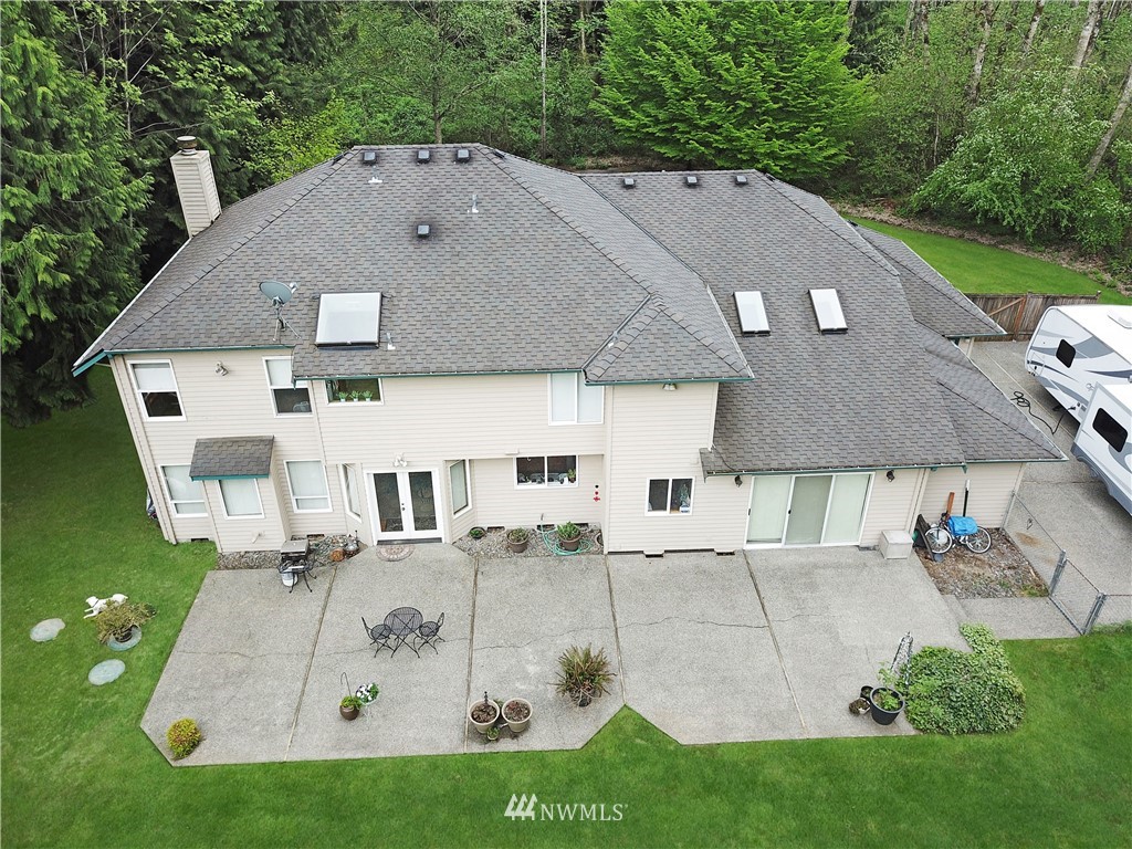 4025 204th Street Southeast Bothell, WA 98012 - Photo 28 of 35 an aerial view of a house with a yard