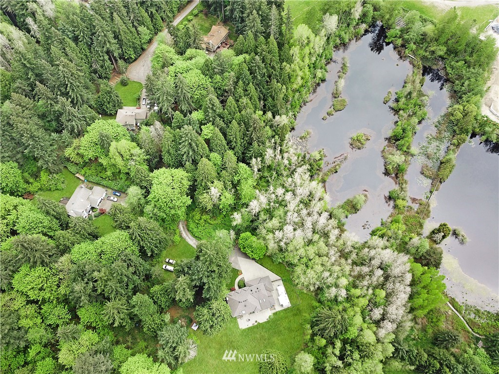 4025 204th Street Southeast Bothell, WA 98012 - Photo 34 of 35 an aerial view of residential house with outdoor space and trees all around