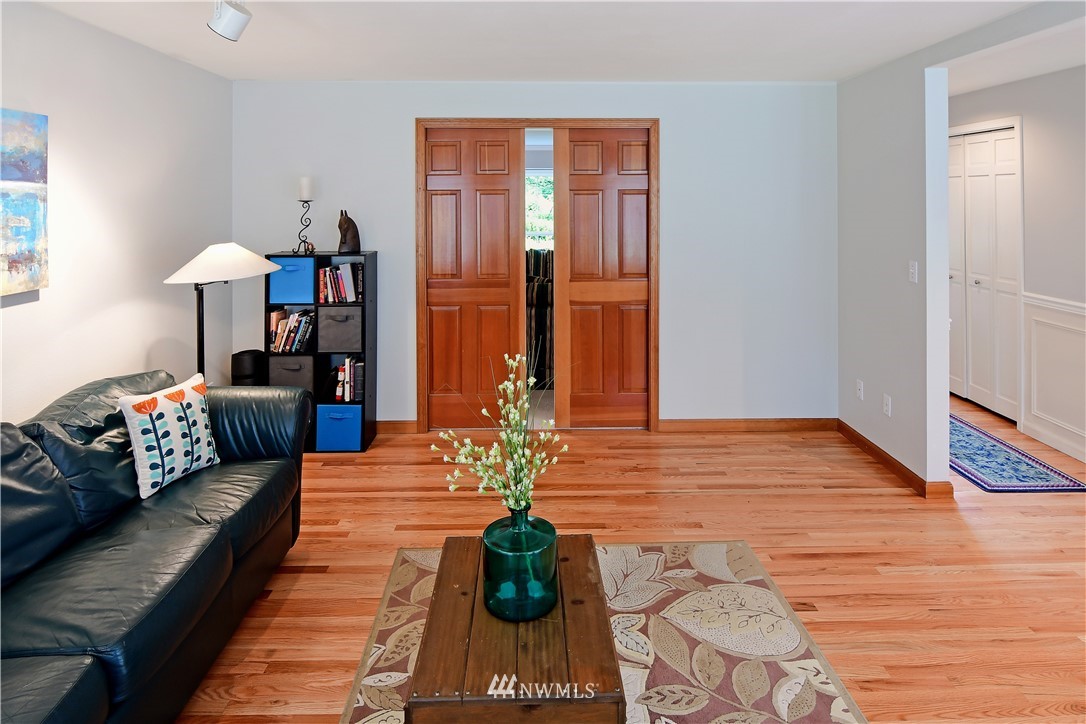 4025 204th Street Southeast Bothell, WA 98012 - Photo 5 of 35 a living room with furniture and a table