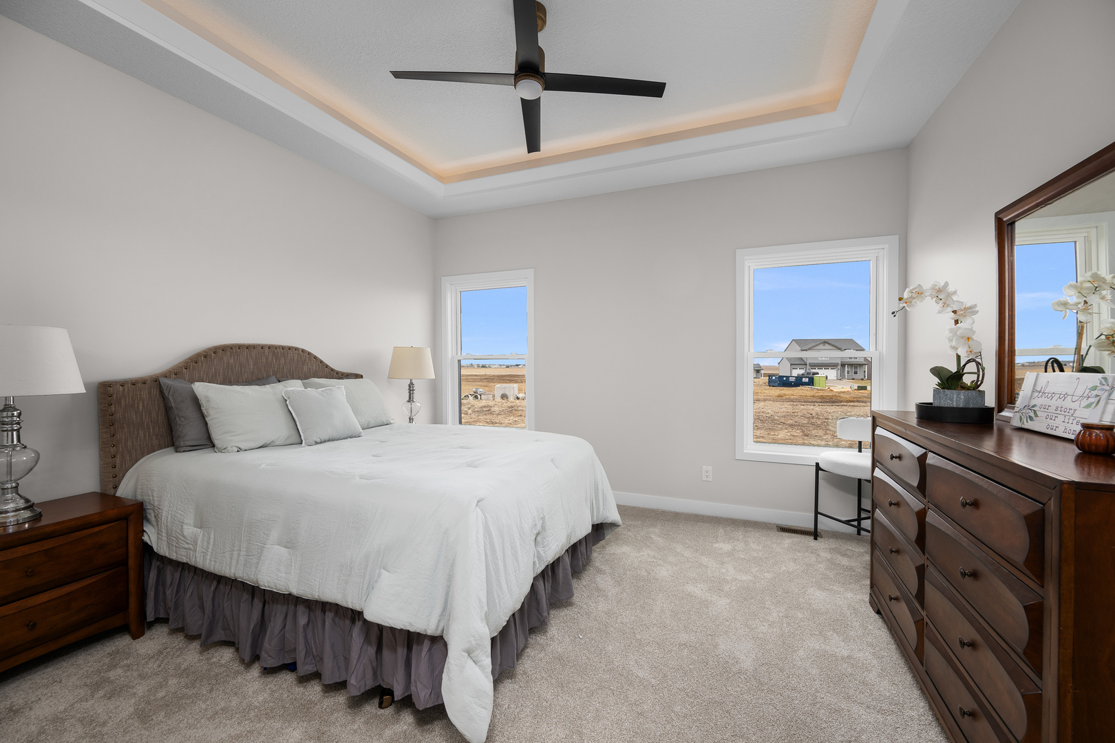 1832 Redbud Circle Eldridge, IA 52748 - Photo 18 of 35 a bedroom with a large bed and a desk