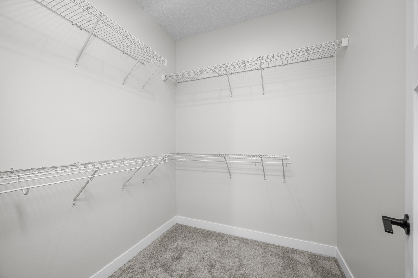 1832 Redbud Circle Eldridge, IA 52748 - Photo 23 of 35 a view of a room with racks on the wall