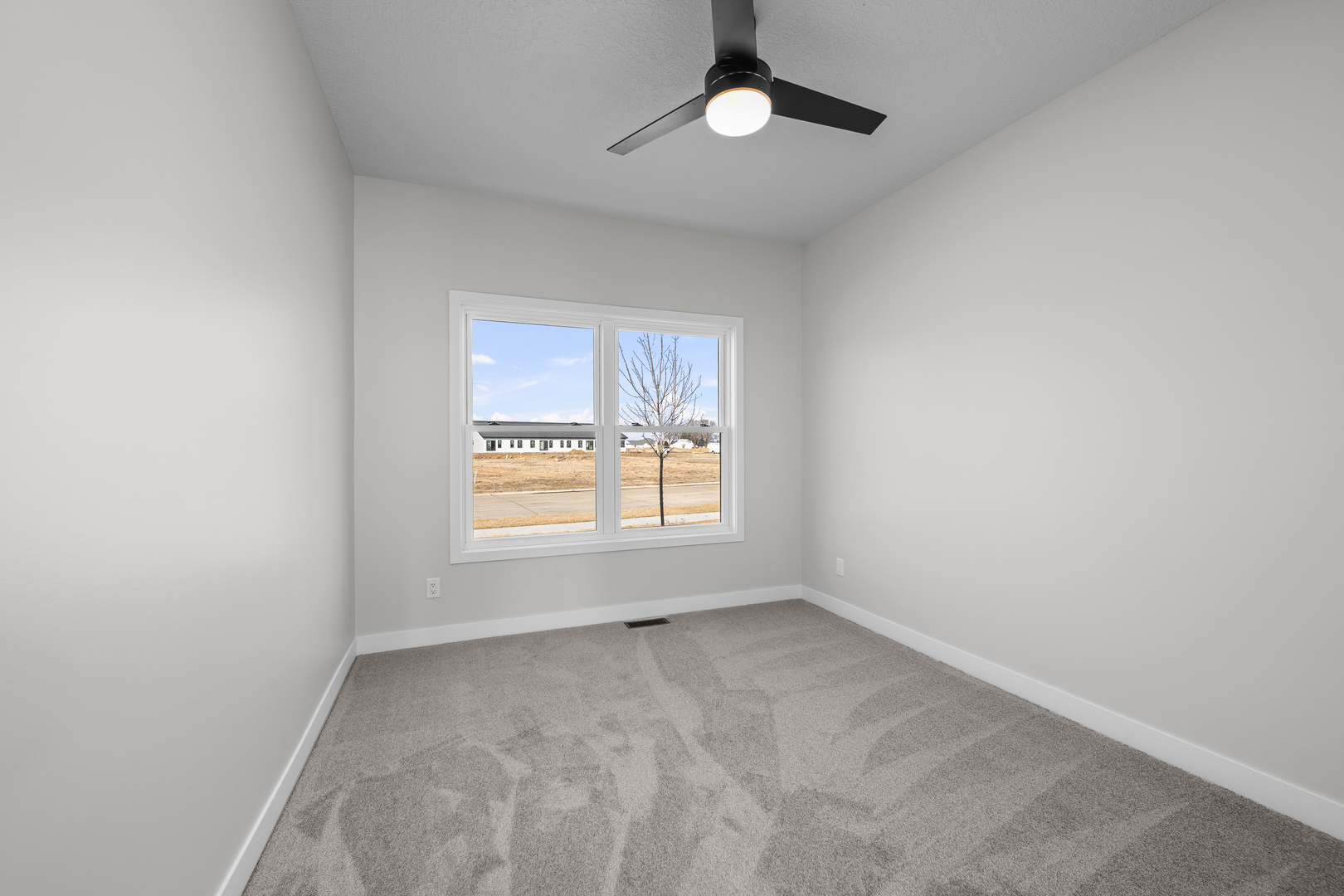 1832 Redbud Circle Eldridge, IA 52748 - Photo 24 of 35 an empty room with a window