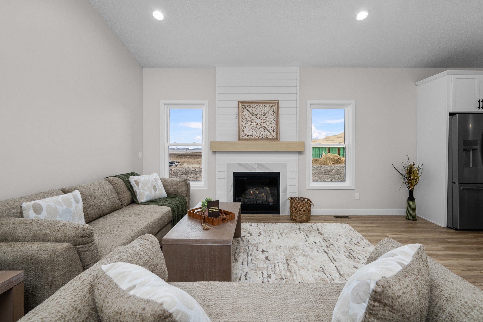 1832 Redbud Circle Eldridge, IA 52748 - Photo 3 of 35 a living room with furniture and a fireplace
